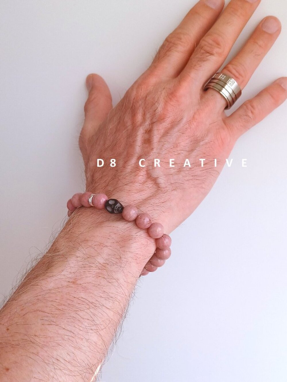 Men's sterling silver with natural rhodonite stone hand woven bracelet